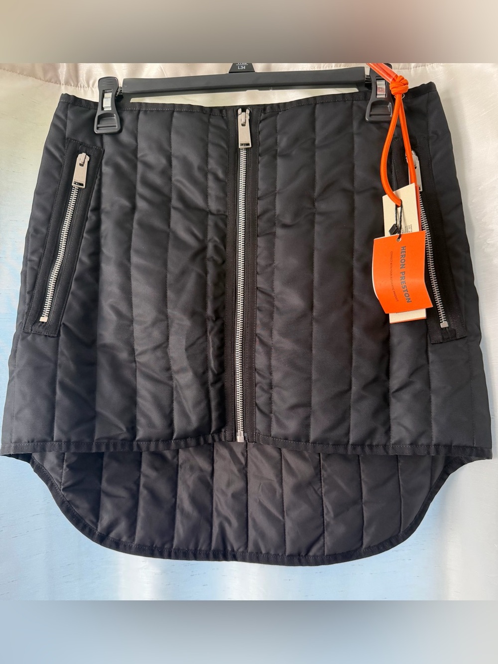 Heron Preston Black Quilted Skirt with Orange Brand Tab
